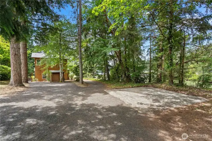 Long private driveway provides exceptional privacy while leading to the waterfront home. Long private driveway provides exceptional privacy while leading to the waterfront home.