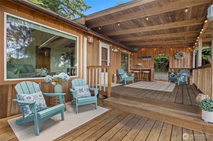 Multiple outdoor seating areas invite you to relax and enjoy the peaceful waterfront setting. Multiple outdoor seating areas invite you to relax and enjoy the peaceful waterfront setting.