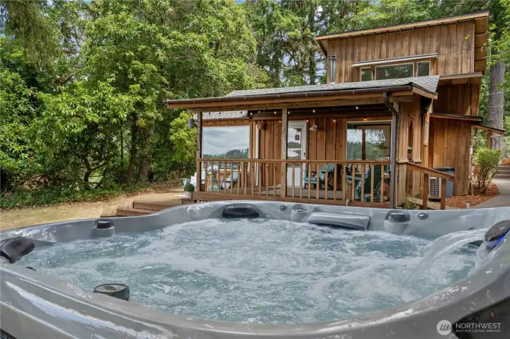 Private hot tub with beautiful waterfront views offers a true Pacific Northwest retreat experience. Private hot tub with beautiful waterfront views offers a true Pacific Northwest retreat experience.