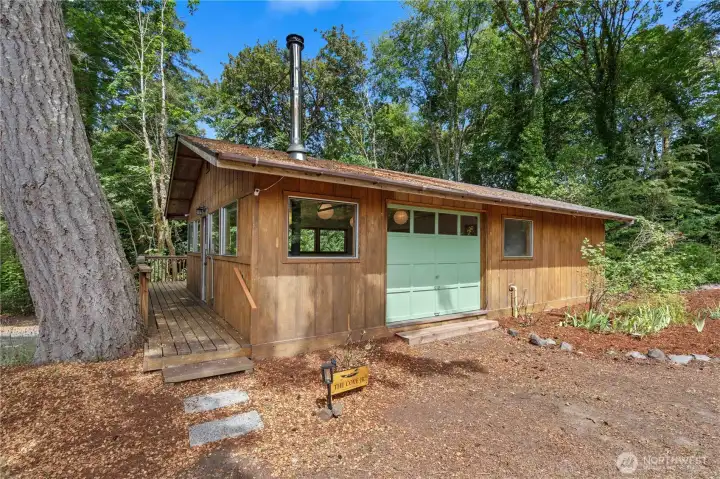Detached bonus building offers exceptional flexibility for hobbies, creative space, storage, or recreational use, surrounded by mature Pacific Northwest landscaping. Detached bonus building offers exceptional flexibility for hobbies, creative space, storage, or recreational use, surrounded by mature Pacific Northwest landscaping.