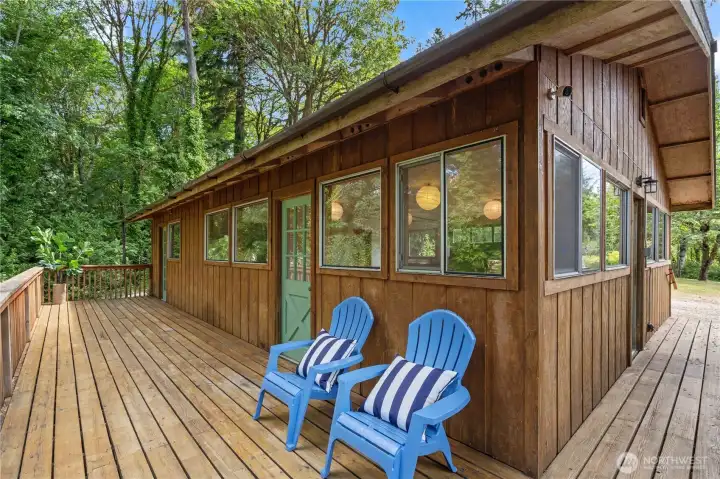 Expansive deck offers the perfect place to enjoy morning coffee, entertain guests, and soak in the peaceful natural surroundings. Expansive deck offers the perfect place to enjoy morning coffee, entertain guests, and soak in the peaceful natural surroundings.
