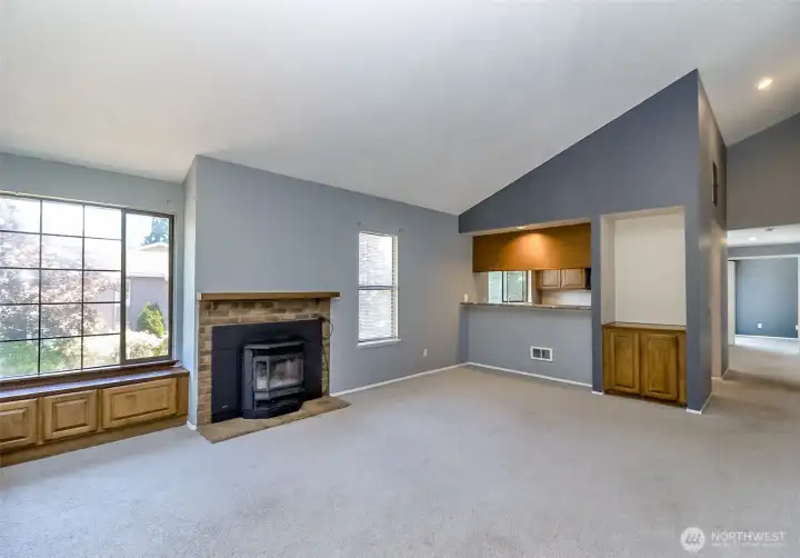 Large open area, fireplace, and dry bar area. Large open area, fireplace, and dry bar area.