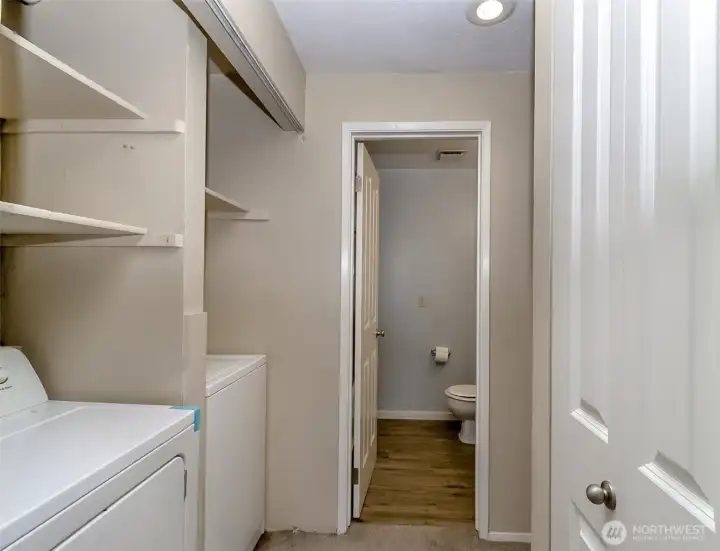 Hallway to main bathroom & 2nd bedroom w/laundry area. Hallway to main bathroom & 2nd bedroom w/laundry area.