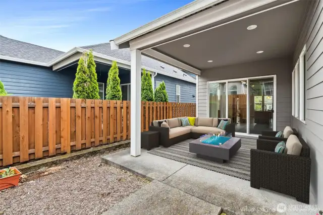 Enjoy a fully fenced, low-maintenance yard with a gas line for BBQ—designed for easy living so you can take full advantage of the community clubhouse amenities. The courtyard-style covered patio is perfect for rainy PNW days, extending your outdoor living space and creating a cozy spot for year-round gatherings and relaxation.