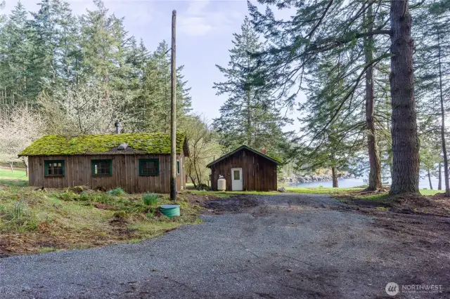 The shop and back side of the cabin looking out towards the water.
