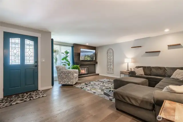 Beautiful front living room with shiplap fireplace and floating mantle