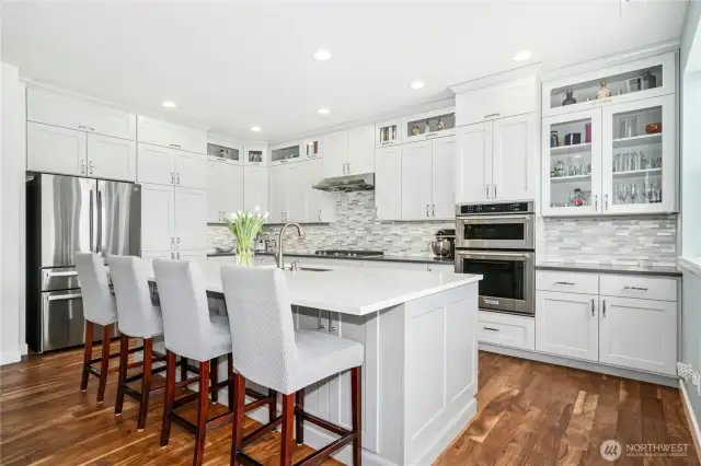 Fully remodeled in 2019! White cabinets, white Quartz counters, tile backsplash, gas cooking and stainless steel appliances.