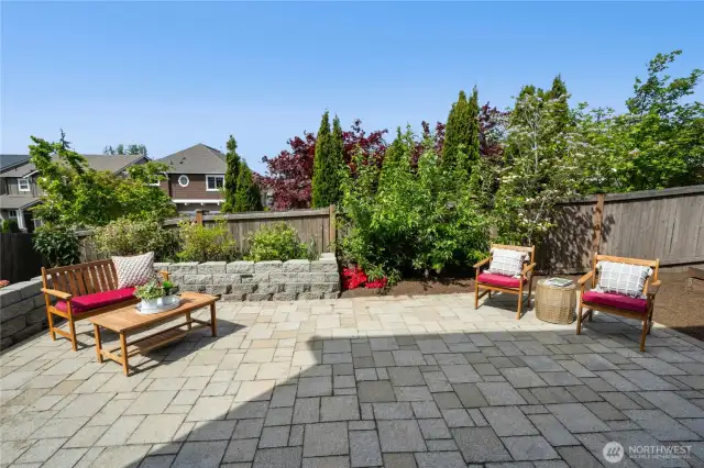 Backyard patio. Backs to neighborhood green space for added privacy.