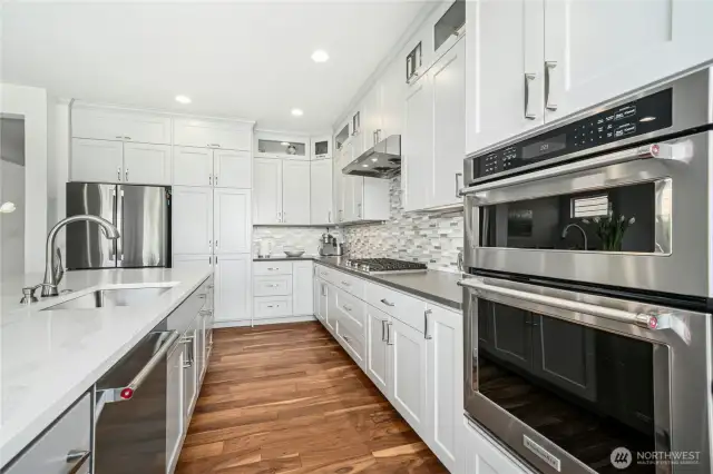 Fully remodeled in 2019! White cabinets, white Quartz counters, tile backsplash, gas cooking and stainless steel appliances.