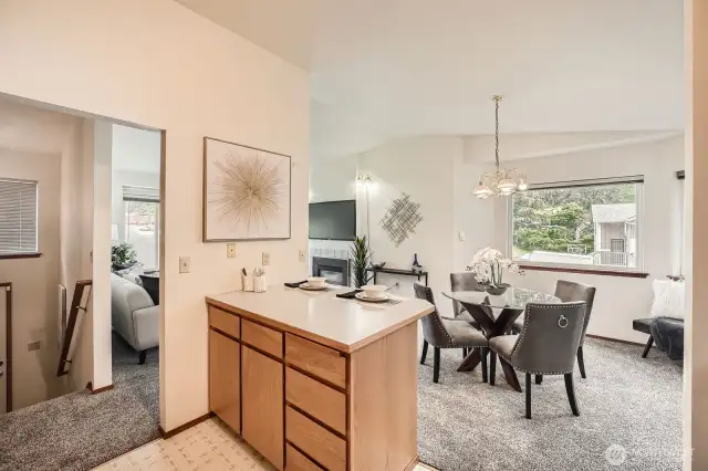 View from the kitchen into the living and dining rooms.