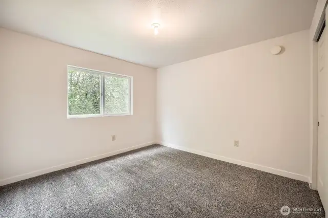 Second bedroom downstairs, for a total of four in the house.