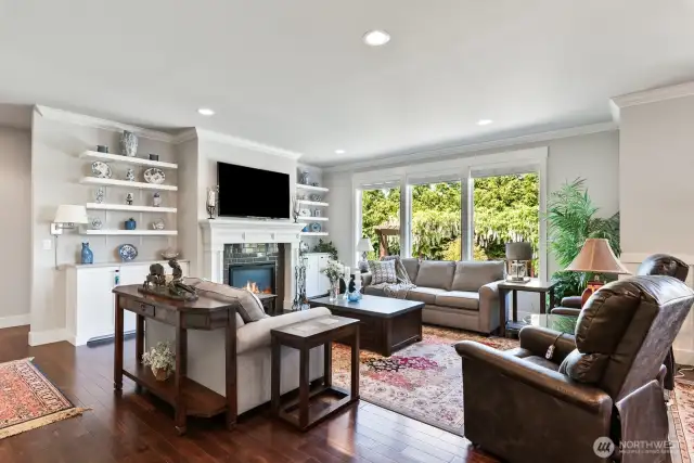 Large great room concept living space is flooded with natural light.
