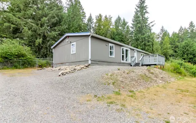 Welcome to this turnkey home w/loads of privacy!