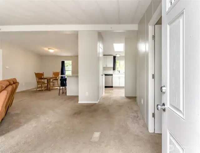 Inside you'll find an open concept living area that has the living flowing into the dining and into the kitchen.