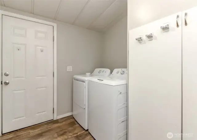 Perfect laundry setup (washer & dryer stay!) with access to the back of the home!