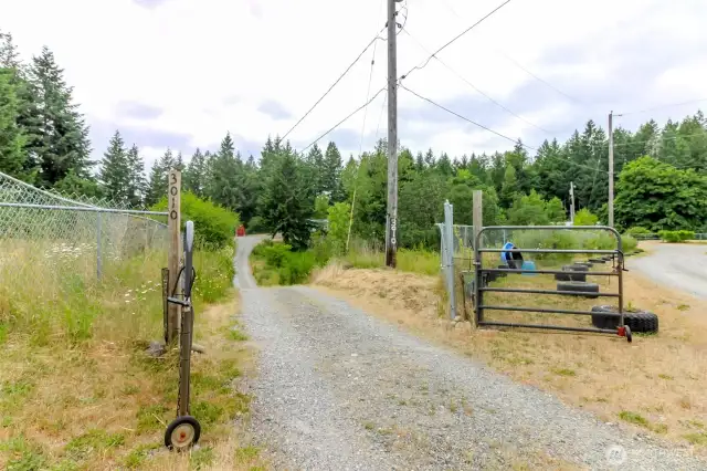 Enjoy a quiet and serene home up this drive!
