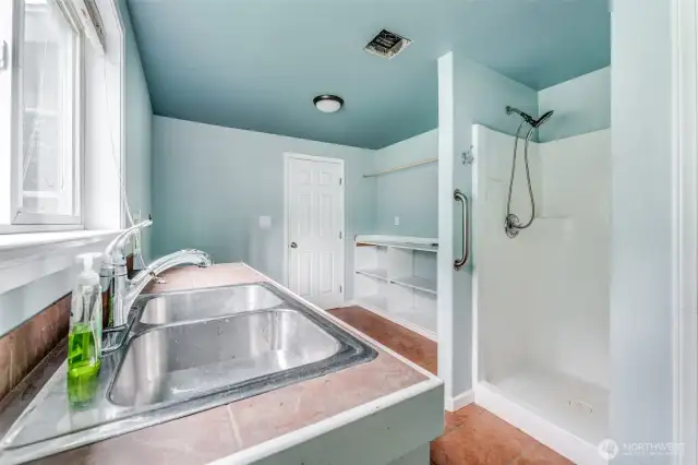 Laundry Room with 3/4 Bathroom