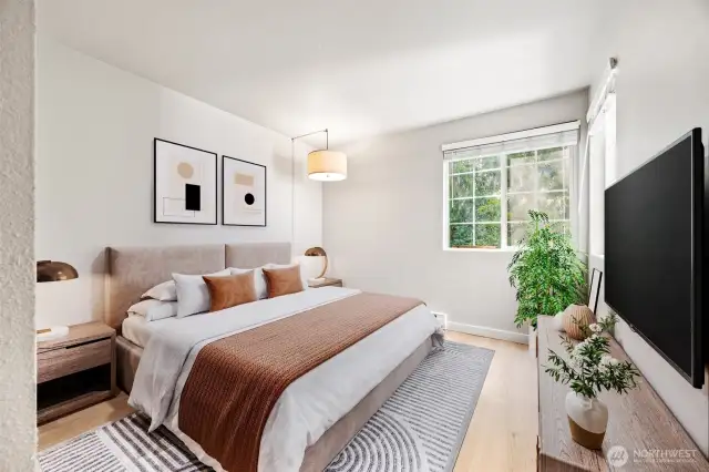 Bedroom #2 offers flexibility—ideal as a cozy bedroom or a serene home office with views of the creek
