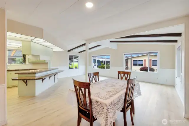 You'll also find another generously sized living area and an open area that can fit a large dining table if desired.