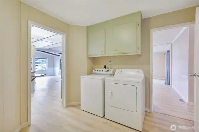 Your backdoor from the carport opens to a large laundry/mud room.