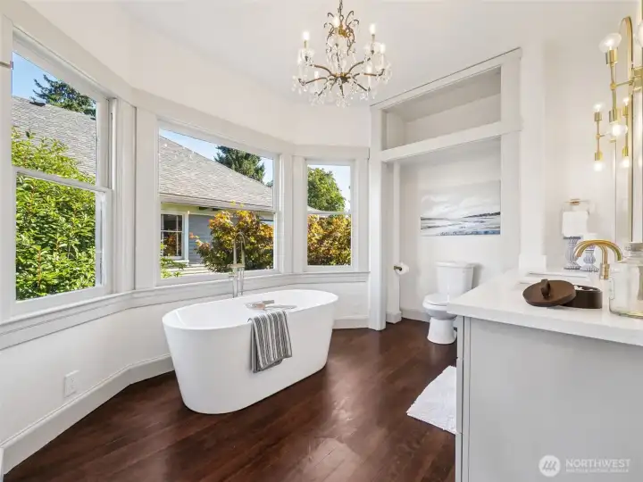 Pedestal tub with peak-a-boo views of the Sound.