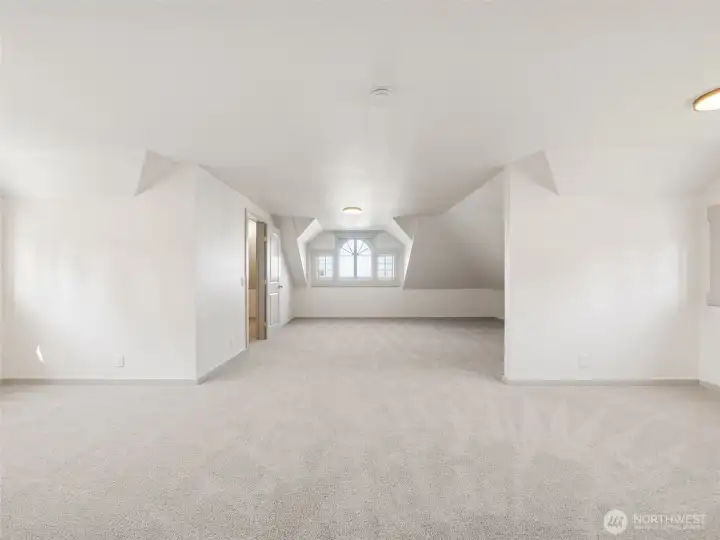 3rd floor family room with closets. Check out the peak-a-boo views
