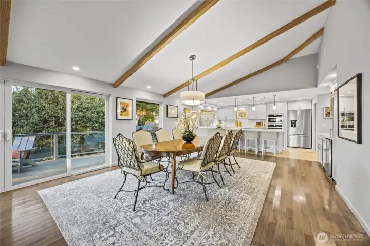 Fantastic dining space and kitchen with vaulted ceilings, sparkling wood floors and all new lighting. Heated kitchen floors.