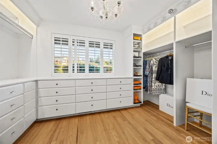 Look at this primary bedroom walk-in closet!