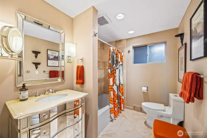 Renovated full bathroom on the main floor to service the 2nd bedroom.