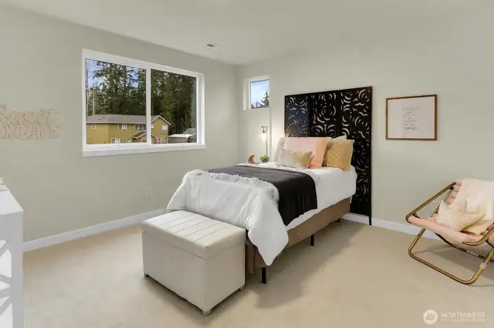 Spacious and filled with natural light, the secondary bedrooms offer comfort and flexibility.