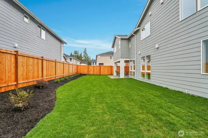 Host summer barbecues, set up a cornhole tournament, or just relax in your fully fenced landscaped backyard.