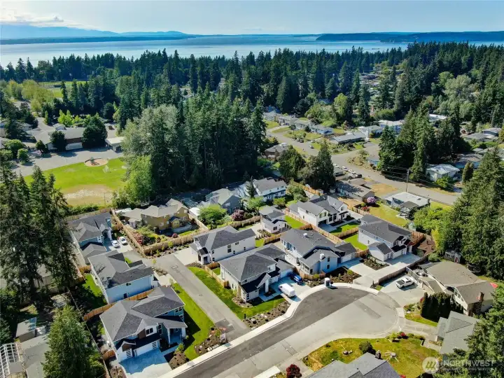 Aerial view of the community showing proximity to the Sound.
