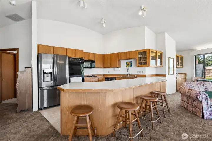 Large cooks kitchen with lots of storage.