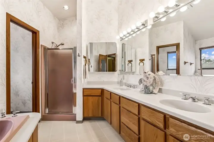 Master bathroom featuring double vanity, walk in shower and ......