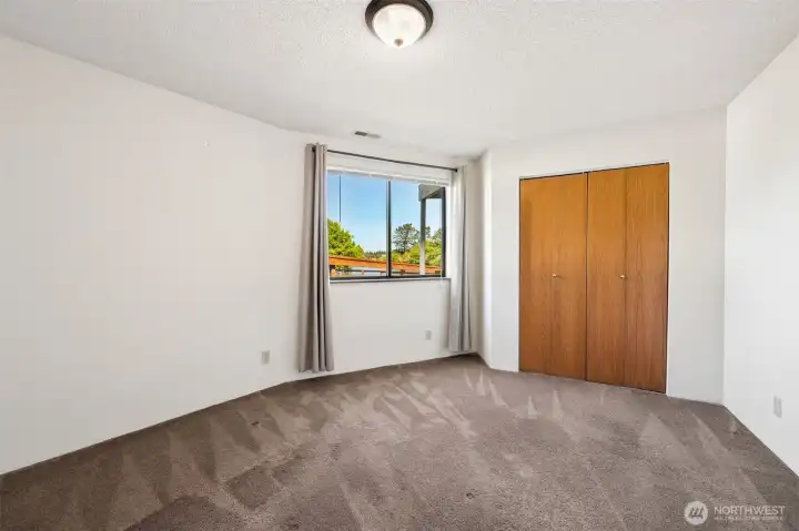 The first of two bedrooms on the ground level.