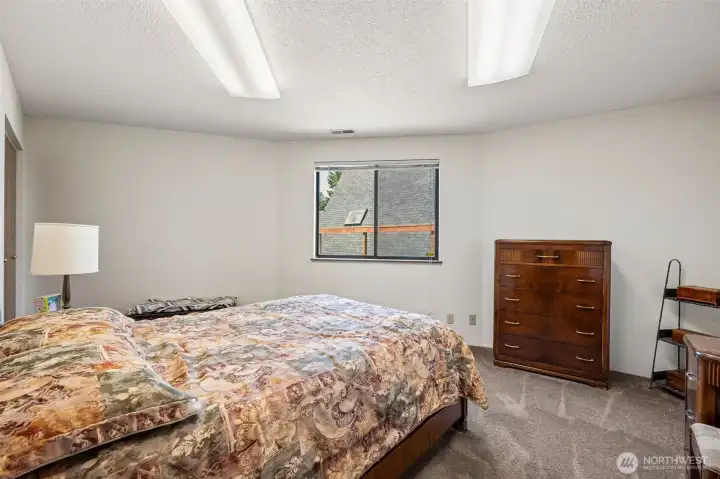 The second bedroom on the ground level, easily accommodates a queen size bed.