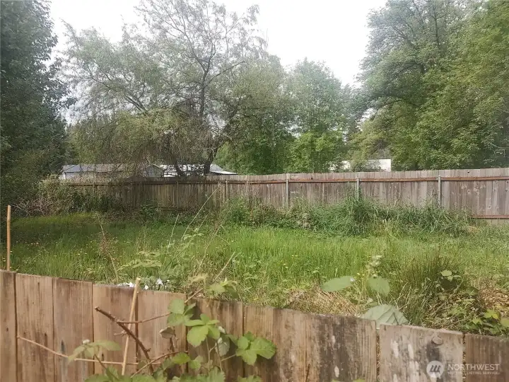 Fenced in yard area Fenced in yard area