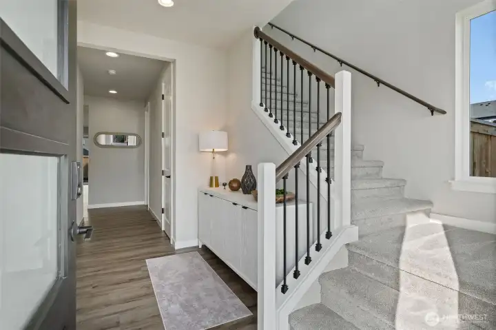 Photos are of another home in the community and are for illustration purposes only to reflect typical finishes.  May depict seller enhancements.  Colors and options may vary.