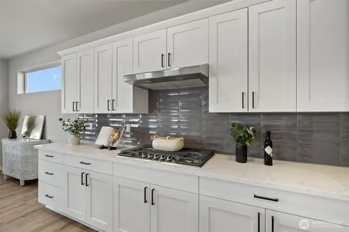 Photos are of another home in the community and are for illustration purposes only to reflect typical finishes.  May depict seller enhancements.  Colors and options may vary.