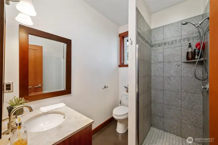 The main floor also has a 3/4 bath adjacent to the laundry room.