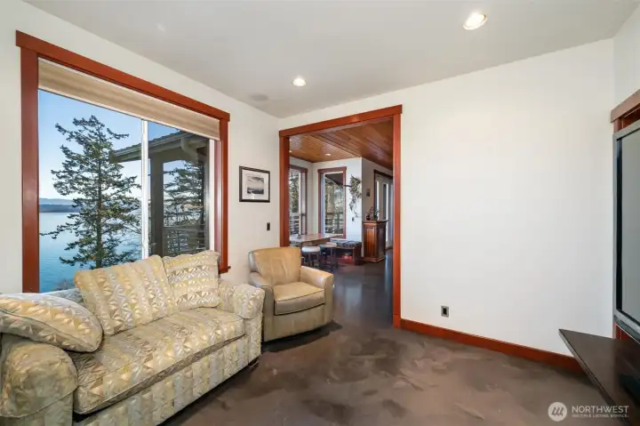 The living room is just off the kitchen and breakfast nook area, and open to the other spaces, but with the same stunning views!