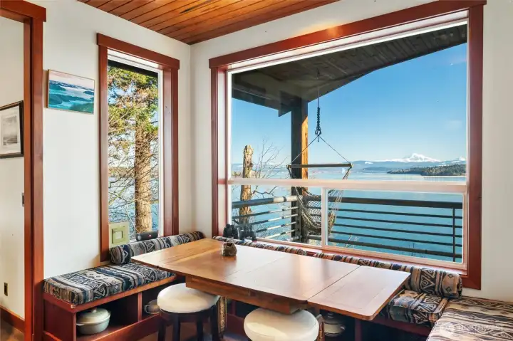 Imagine having your coffee and breakfast sitting here and looking to that amazing view...or swinging in the hammock chair on a warm summer morning!