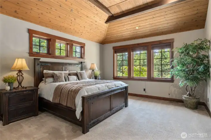 Primary bedroom with wood ceiling