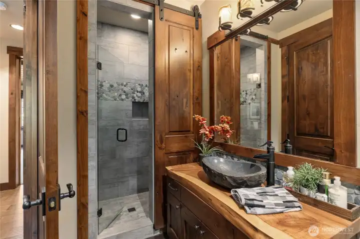 3/4 Bath with a shower behind the barn door
