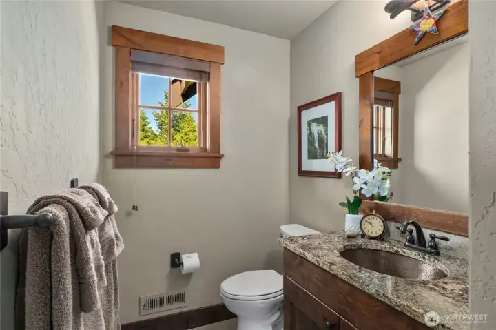 Upstairs bathroom with tile shower