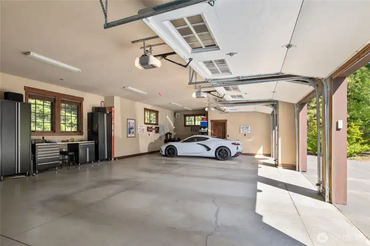 Huge 3 car garage with lots of room for storage and toys