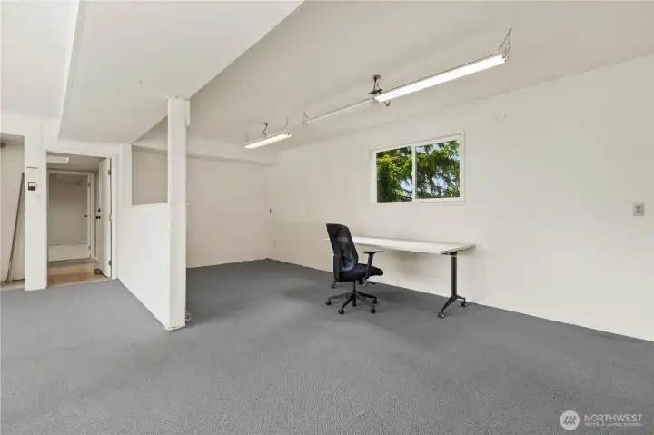 And this is my favorite.  Imagine a small Fiat sitting where that desk is.   That is what the original owner used this workshop area for