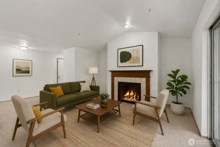 Cozy wood-burning fireplace creates warmth and charm.  [Virtually staged]