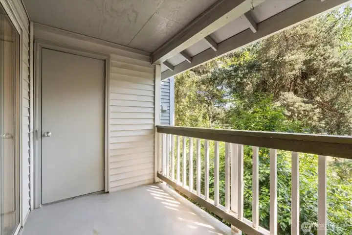 Private balcony with additional exterior storage closet.