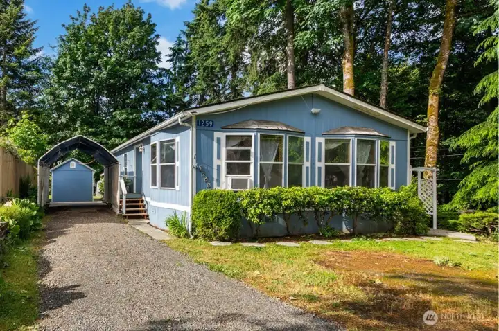 Tucked against a beautiful forested backdrop, this sweet home offers the kind of privacy and seclusion that is incredibly rare.